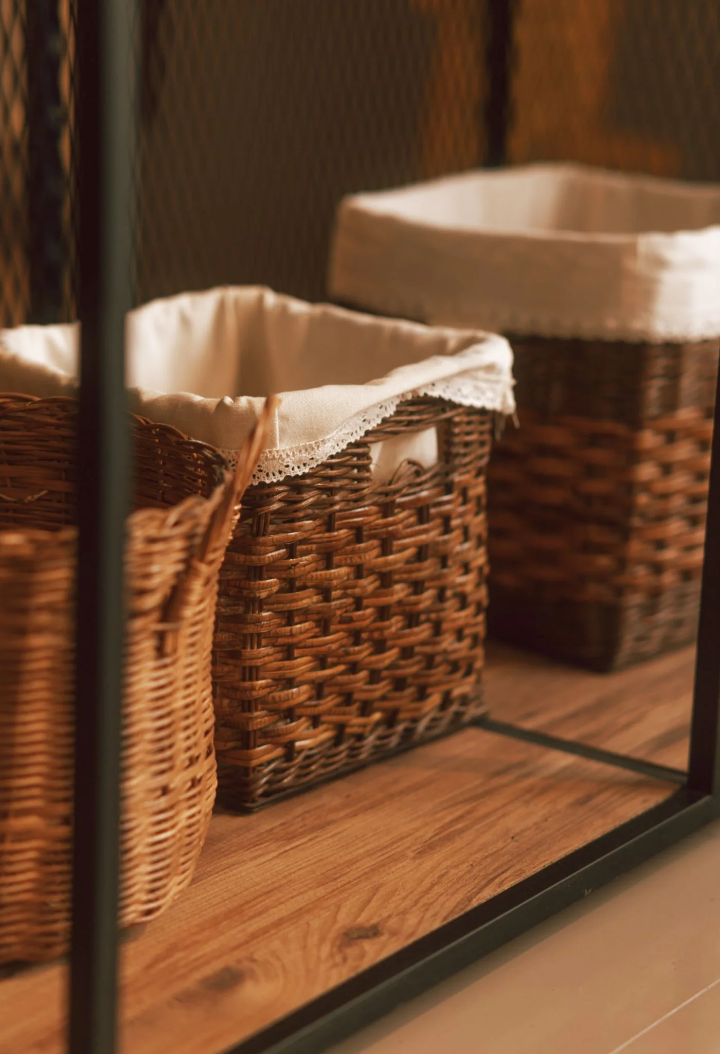 Woven storage baskets in a warm interior